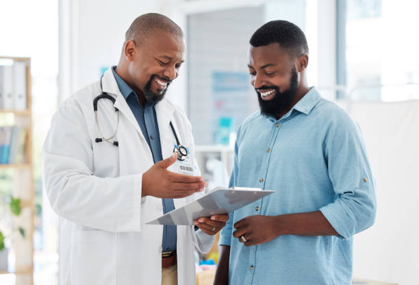 Doctor reviewing results with a patient during a checkup